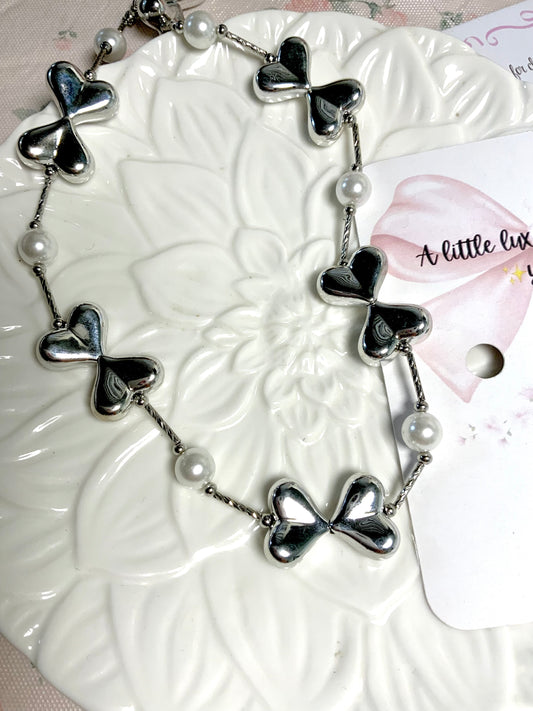 Pearlette bow necklace
